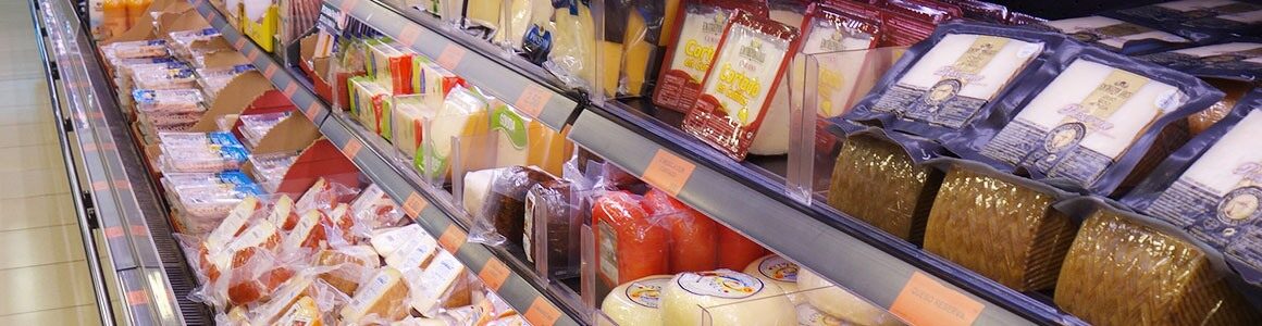 Dairy packaging products in a grocery store.