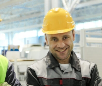 Great workplace culture three happy manufacturing workers