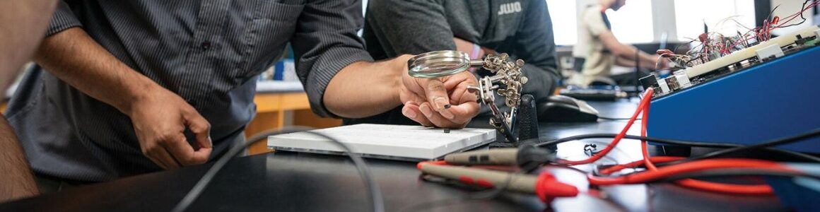 Students at UW-Oshkosh in an engineering class work on a project.