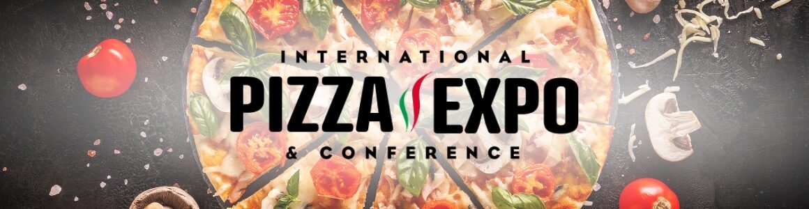 Tomato, basil, mushroom pizza with International Pizza Expo & Conference Logo.