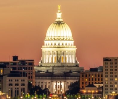 Madison, Wisconsin Capitol building downtown skyline at dusk.