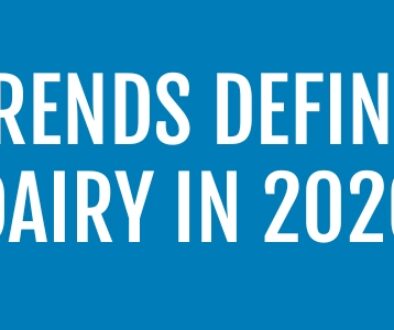 Graphic showing yogurt and dairy products in a refrigerated case alongside assorted cheeses, with text reading “5 Trends Defining Dairy in 2026.”