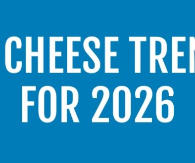 Assorted cheeses with the words "top cheese trends for 2026"