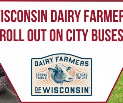 Banner showing city buses on one side and dairy cows grazing in a pasture on the other, with text about Wisconsin dairy farmers appearing on city buses