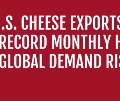 Banner image showing assorted cheeses, and a world map with various pinpoint locations. Text reads "U.S. Cheese Exports Hit Record Monthly High as Global Demand Rises"